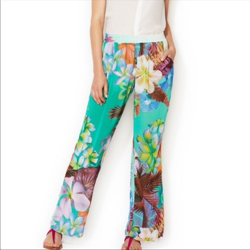 Funky beach pants with tropical flower pattern.